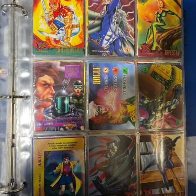 Sale Photo Thumbnail #215: Vintage trading cards from marvel, primal rage, Jurassic park, Godzilla, space jam, ninja turtles, and the crow