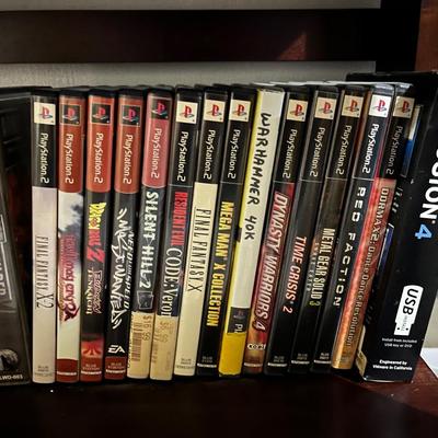 Sale Photo Thumbnail #246: Game lot for the Sony PlayStation 2.  Army builder and VMware Fusion 4 included as well.

*shipping available at buyers expense