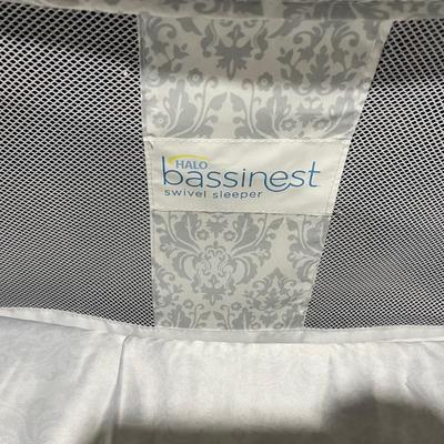Sale Photo Thumbnail #76: Bassinet rotates around full 360 degrees and can swivel over your bed. Front section does fold down to help with picking up and putting down a baby.  Functions on the front controller all work and include faint lights, heart beat sound maker, volume contr