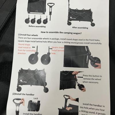 Sale Photo Thumbnail #229: Folding camping wagon that easily breaks down for storage. Great for beach outings or picnics with the family.  Never used and still in original box.