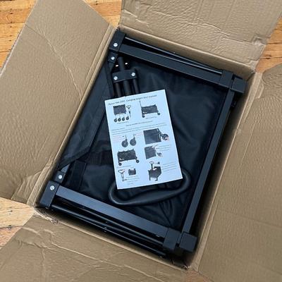 Sale Photo Thumbnail #231: Folding camping wagon that easily breaks down for storage. Great for beach outings or picnics with the family.  Never used and still in original box.