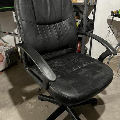 Sale Photo Thumbnail #232: Leather office desk chair in great condition.  Leather has been taken good care of with conditioner and chair rotates and swivels back.  Locking and adjustable height mechanisms work perfectly.