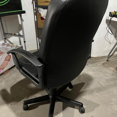 Sale Photo Thumbnail #233: Leather office desk chair in great condition.  Leather has been taken good care of with conditioner and chair rotates and swivels back.  Locking and adjustable height mechanisms work perfectly.