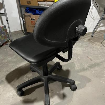 Sale Photo Thumbnail #248: Small office leather office desk chair. Height is adjustable and the rollers are all in good condition.