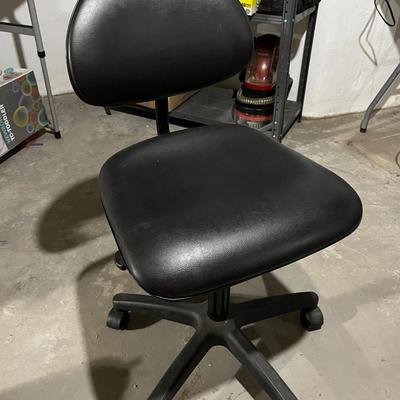 Sale Photo Thumbnail #247: Small office leather office desk chair. Height is adjustable and the rollers are all in good condition.