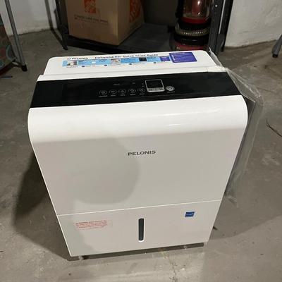 Sale Photo Thumbnail #182: Used dehumidifier by Pelonis. Works perfectly and has drain to attach a garden hose to allow for continuous use without having to empty the collection bin.