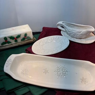 Sale Photo Thumbnail #81: Two rectangular tablecloth, candle, gravy boat, and serving dishes