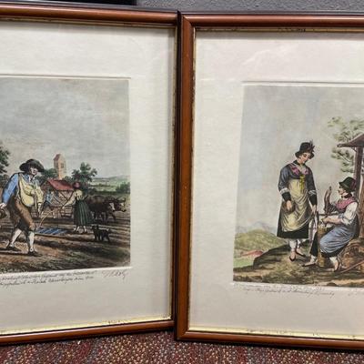 2 framed hand signed art