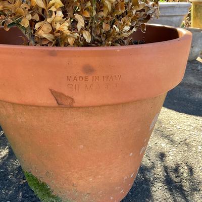 O569 Lot of four Terracotta Flower Pots with metal stand