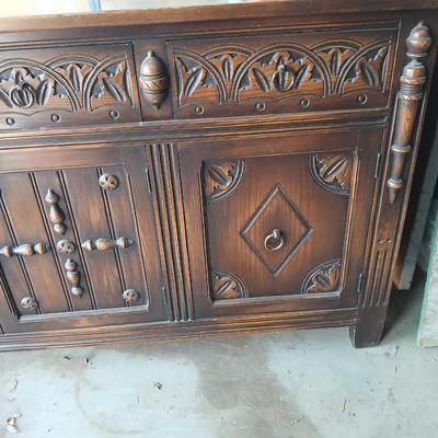 Antique oak Gothic Revival sideboard or buffet, likely English or Dutch, from the early 20th century
