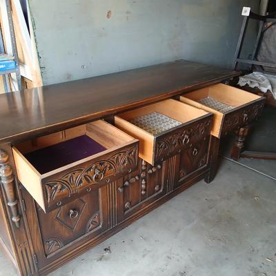 Antique oak Gothic Revival sideboard or buffet, likely English or Dutch, from the early 20th century