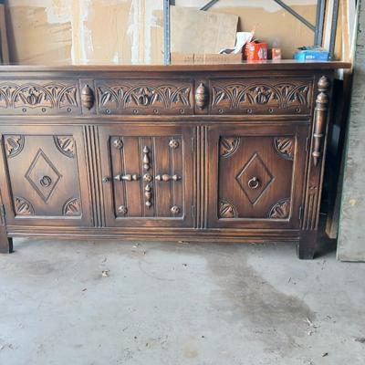 Antique oak Gothic Revival sideboard or buffet, likely English or Dutch, from the early 20th century