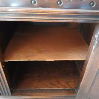 Antique oak Gothic Revival sideboard or buffet, likely English or Dutch, from the early 20th century