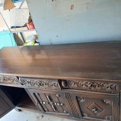Antique oak Gothic Revival sideboard or buffet, likely English or Dutch, from the early 20th century