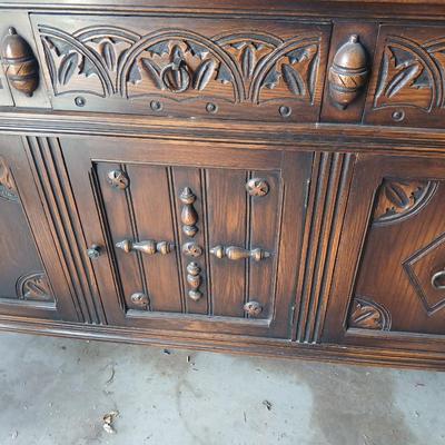 Antique oak Gothic Revival sideboard or buffet, likely English or Dutch, from the early 20th century