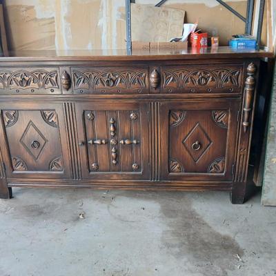 Antique oak Gothic Revival sideboard or buffet, likely English or Dutch, from the early 20th century