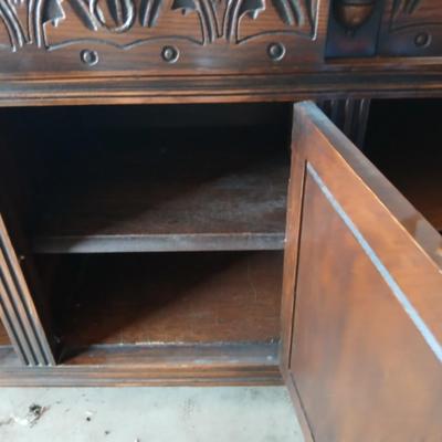 Antique oak Gothic Revival sideboard or buffet, likely English or Dutch, from the early 20th century