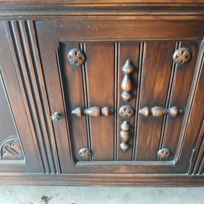 Antique oak Gothic Revival sideboard or buffet, likely English or Dutch, from the early 20th century