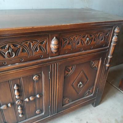 Antique oak Gothic Revival sideboard or buffet, likely English or Dutch, from the early 20th century