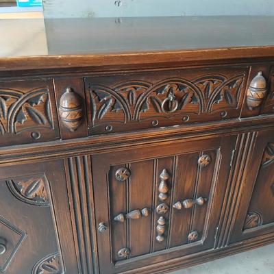 Antique oak Gothic Revival sideboard or buffet, likely English or Dutch, from the early 20th century