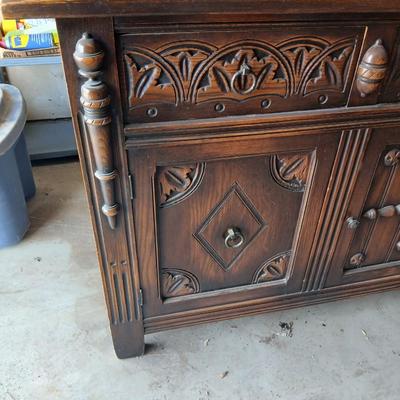 Antique oak Gothic Revival sideboard or buffet, likely English or Dutch, from the early 20th century
