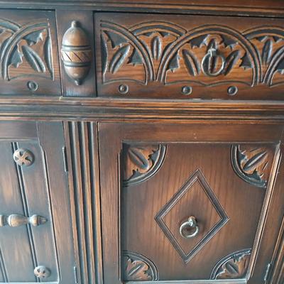 Antique oak Gothic Revival sideboard or buffet, likely English or Dutch, from the early 20th century