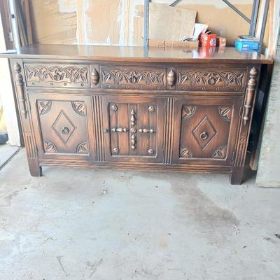 Antique oak Gothic Revival sideboard or buffet, likely English or Dutch, from the early 20th century