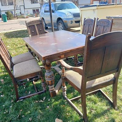 Antique dining room table with six matching chairs well over 100 years old!