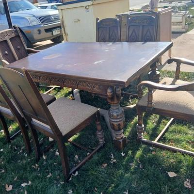 Antique dining room table with six matching chairs well over 100 years old!