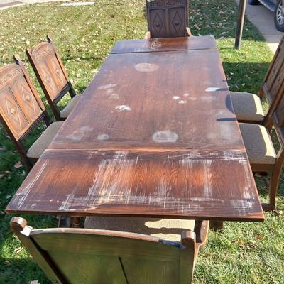 Antique dining room table with six matching chairs well over 100 years old!