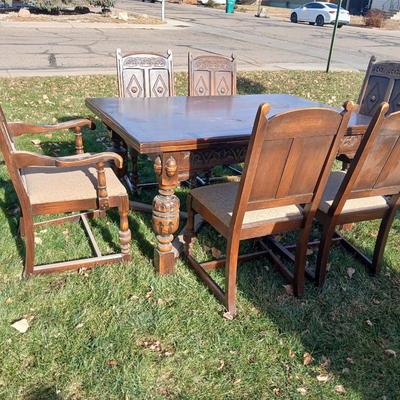 Antique dining room table with six matching chairs well over 100 years old!