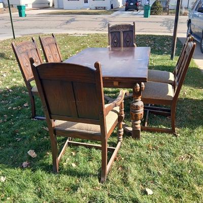 Antique dining room table with six matching chairs well over 100 years old!