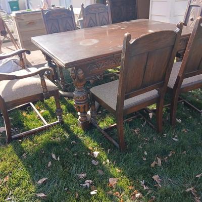 Antique dining room table with six matching chairs well over 100 years old!