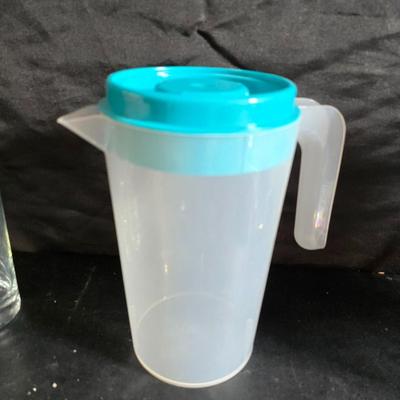 Brita water pitcher with new filter - Six drinking glasses, a tablecloth and a plastic pitcher with lid