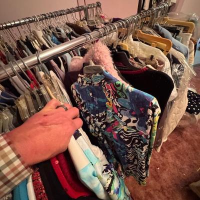 A Rack & a Closet Full of Ladies Clothing