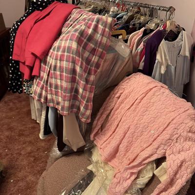 A Rack & a Closet Full of Ladies Clothing