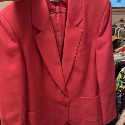 A Rack & a Closet Full of Ladies Clothing