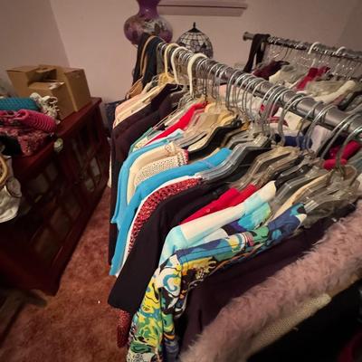 A Rack & a Closet Full of Ladies Clothing