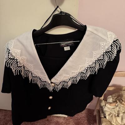 A Rack & a Closet Full of Ladies Clothing