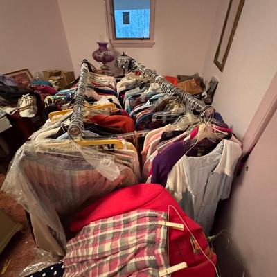 A Rack & a Closet Full of Ladies Clothing