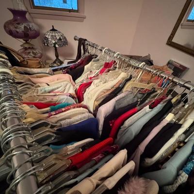 A Rack & a Closet Full of Ladies Clothing