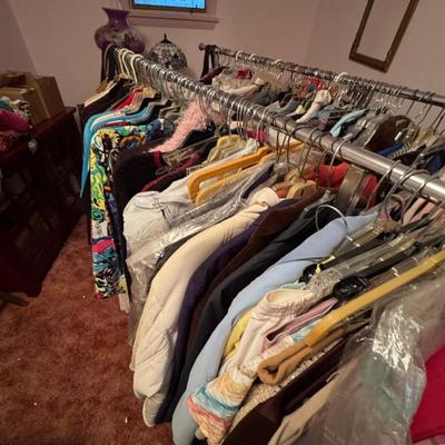 A Rack & a Closet Full of Ladies Clothing