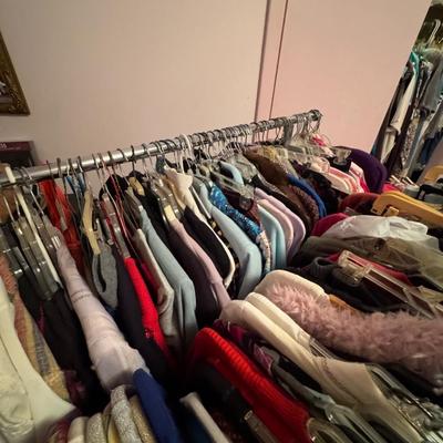 A Rack & a Closet Full of Ladies Clothing