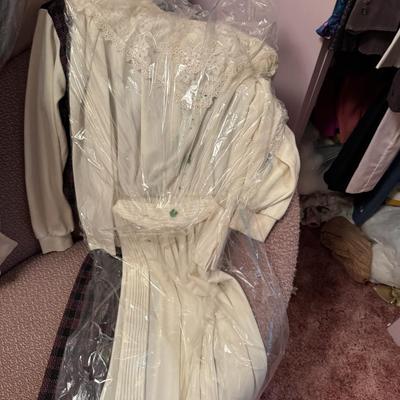 A Rack & a Closet Full of Ladies Clothing