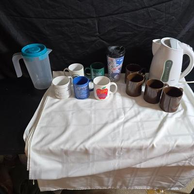 Phillips Electronics water kettle - Plastic water pitcher - and a few mugs