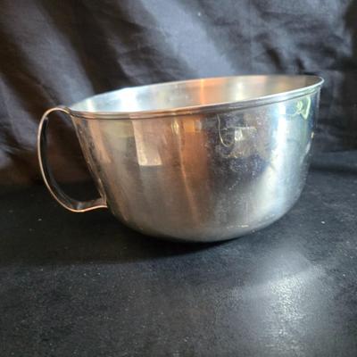 KitchenAid handmixer with new KitchenAid measuring cups, stainless spoons, and a nice stainless bowl