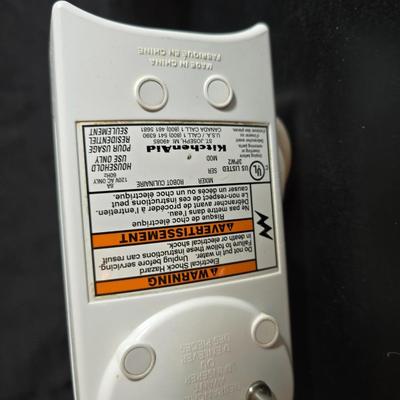 KitchenAid handmixer with new KitchenAid measuring cups, stainless spoons, and a nice stainless bowl