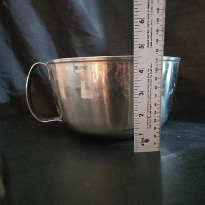 KitchenAid handmixer with new KitchenAid measuring cups, stainless spoons, and a nice stainless bowl