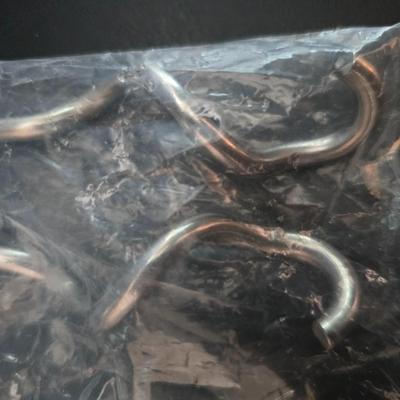 KitchenAid handmixer with new KitchenAid measuring cups, stainless spoons, and a nice stainless bowl