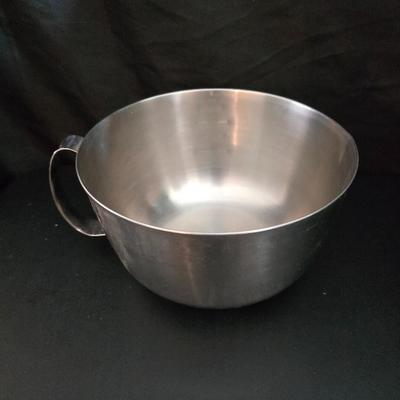 KitchenAid handmixer with new KitchenAid measuring cups, stainless spoons, and a nice stainless bowl